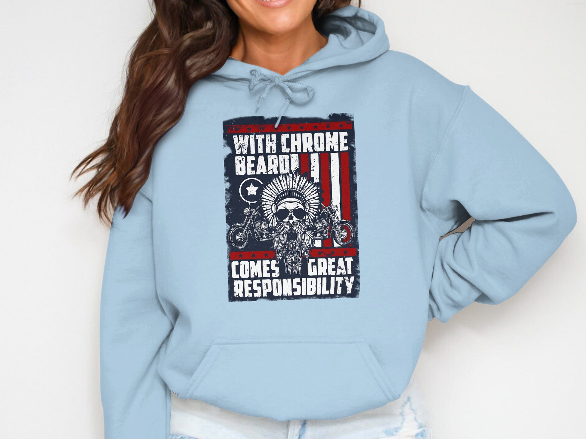 Light blue hoodie with graphic featuring a skull, flags, and motorcycles.